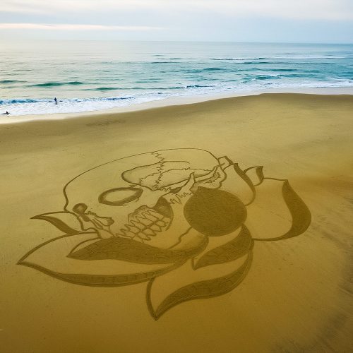 Beach art lotus and skull