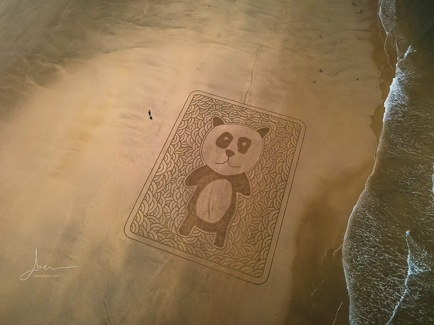 Beach art : Patient Panda Sunbathing